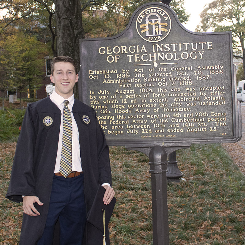 Tori Granelli with the Georgia Tech historical marker in front of Tech Tower.