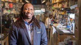 Manu Platt standing in his lab