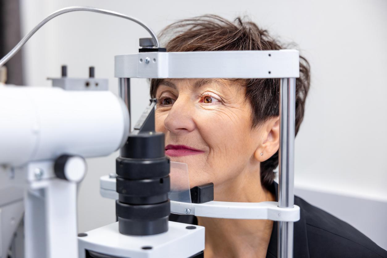 Older woman getting an eye exam